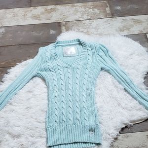 A patterned sweater